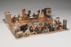 an assortment of figurines on a chess board