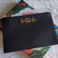 Authentic Gucci 2 Tone Clutch/ Pouch. Never Waste Time Deciding To Wear Gold Or Sliver Tone Accessories Again With This Gorgeous 2 Tone Gucci Clutch. Features Yellow And Silver Logo That Goes With Any Of Your Beautiful Outfits. Huge Trend To Add A Chain To A Clutch Or Pouch So Don’t Second Guess It And Make Any Customization That You Like. Makes An Amazing Gift This Beautiful Clutch Comes In The Shipping Box, The Designer Box Floral Print W Logo And The Beautiful Silk Floral Dust Bag With Gucci Designer Business Clutch With Gold-tone Hardware, Luxury Gucci Rectangular Clutch, Luxury Gucci Clutch, Gucci Rectangular Clutch For Formal Occasions, Designer Gucci Clutch For Evening Events, Gucci Formal Rectangular Clutch, Chic Gucci Leather Clutch, Elegant Gucci Rectangular Clutch, Elegant Gucci Leather Clutch