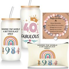 three personalized items are displayed in front of a birthday card, pillow, and candle holder