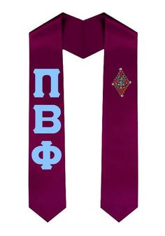 a purple scarf with the letters nbp on it and an embroidered cross at the center