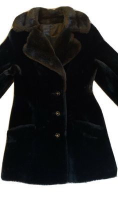 Vintage Borgana Black Faux Fur Coat Sz S Lined Russel Taylor Borg Textiles Soft. The outside faux fur is in nice condition. Very soft. The lining does have tears/holes at seams of arm where sleeve is stitched to inner body lining (one is approximately 8” and the other 5”). Pocket also has a hole. No stains are noted. Pit to pit 16” laying flat Length from top of collar approximately 32.5” Length from bottom of collar approximately 29” Waist laying flat approximately 15” Sleeve from top of collar Black Faux Fur Coat, Union Made, Black Faux Fur, Faux Fur Coat, Fur Coat, Faux Fur, Textiles, Collar, Black