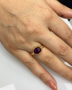 Natural Amethyst Ring * Dainty Cabachon Ring * Genuine Amethyst & 14K Solid Gold * Best Gift for her * Handmade Ring ◎ Details ◎ ○ Gemstone Details .Natural AMETHYST Oval Cut 10x8 mm approx. 2.90 ct ○ Gold Details 14K Solid Gold Width of Band : 2.70 mm Weight of Ring : approx 4.25 gr Made to Order HANDMADE ITEM ○ Upgrade to Solid 18K Gold, please click the link below: https://www.etsy.com/listing/962826004 ○ CABACHON BEZEL rings : http://etsy.me/37fvI60 ○ AMETHYST rings : https://etsy.me/33S Amethyst Rings, Ring Jewellery Design, Dainty Band, Topaz Color, Bezel Ring, Best Gifts For Her, Men's Jewelry Rings, Halo Ring, Amethyst Stone