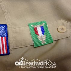 an american flag patch on the chest of a man's uniform