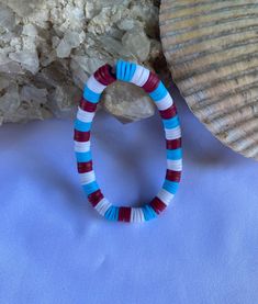 Patriotic Clay Beaded Bracelet Size: 5 inch wrist (for a smaller wrist) (stretchy elastic) Beaded Bangle Bracelets For Beach, Hand-strung Beaded Bangle Bracelets For Beach, Hand-strung Beaded Bangle For Beach, Red Beaded Bracelets For Vacation, Casual Multicolor Bracelets With Polished Beads, Hand-strung Bangle Stretch Bracelet For Beach, Adjustable Polished Bead Bracelets For Beach, Vacation Stretch Bracelet With Round Beads, Adjustable Polished Beads Bracelets For Beach