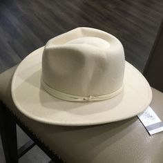 New With Tags. Cream Wide Brim Felt Hat, Cream Fedora Sun Hat For Country Events, White Fedora For Winter Rodeo, White Winter Fedora For Rodeo, White Fedora For Rodeo In Winter, Cream Fedora Hat For Country Events, Cream Country Fedora Hat, Wide Brim Cream Fedora For Country Events, Cream Wide Brim Fedora For Country Events