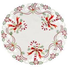 a paper plate decorated with candy canes and bows