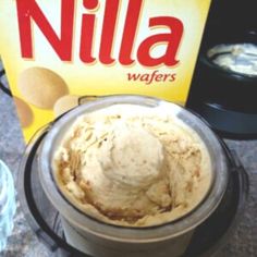 an ice cream in a blender next to a box of nilla wafers