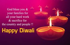 happy diwali greeting card with lit candles on dark purple background and pink hues