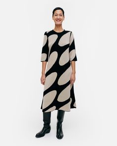 The Putrido knitted dress is made of a merino wool and Ecovero™ viscose blend, and it has a slim fit, a straight top, and a flared cut hem. The dress features the Linssi pattern, a double-ribbed O-neck, and bracelet-length sleeves .

This product contains 64% certified wool and 36% Ecovero™ viscose. Ecovero™ is a trademark of Lenzing AG. Knitted Dress, Cloth Bags, Sale House, Knit Dress, Merino Wool, Length Sleeve, The Dress, Colorful Dresses, Bag Accessories