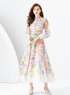 "Bloom into elegance with this pastel-hued masterpiece, a dress that intertwines the gentleness of a spring garden with the grace of high fashion. Boasting an ethereal array of floral designs, this piece is a sartorial tribute to the tender beauty of nature. Its full-length sleeves and high mandarin collar lend a vintage touch, while the fitted waist—highlighted by a delicate belt—creates a flattering silhouette. Crafted from a lightweight, flowing fabric, the dress moves with a dreamlike quality. The soft palette of pinks, greens, and lilacs paints a picture of serene loveliness, perfect for garden parties, springtime weddings, or simply when one wishes to carry the freshness of spring wherever they go." Fabric name: chiffonPattern: printingSkirt length: long skirtSkirt type: flounce skir Twirling Skirt, Printed Long Dress, Soft Palette, Sleeveless Dresses Casual, Flowing Fabric, Flounce Skirt, Minimalist Accessories, Push Up Swimsuit, Printed Long Dresses