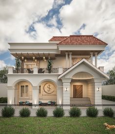 a large white house with a clock on it's front door and balcony area