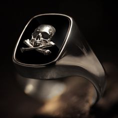 "Considered the \"gentleman's ring\", there doesn't seem to be a more perfect piece of jewelry to proudly wear than our sterling silver signet ring. Our Gentleman's ring is a very unique piece with a straight oval Onyx stone set within. On top of the Onyx sits a sterling silver skull and crossbones design. Shipping&Processing Since all our items are individually handmade, we need about 4 weeks (at most) to make your item. Shipping is on us, we use DHL express so it will only take 3 days on a 14k Gold Timeless Signet Ring For Collectible, 14k Gold Timeless Signet Ring Collectible, Timeless 14k Gold Signet Ring For Collectors, 14k Gold Signet Ring With Polished Finish, Gold Signet Ring With Polished Finish For Collectors, Timeless Gold Signet Ring, Timeless Hallmarked Signet Ring Collectible, Gold 14k Stamped Signet Ring For Formal Occasions, Formal Gold Signet Ring Stamped 14k