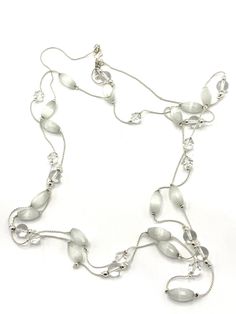 Gorgeous collectible white and clear beads necklace by Daisy Fuentes. Elegant White Glass Beaded Necklaces, Elegant White Glass Beaded Necklace, Elegant White Glass Necklace, White Crystal Necklace With Silver Beads, White Double Strand Beaded Necklace For Party, White Glass Jewelry For Party, White Double Strand Necklace For Party, White Multi-strand Costume Jewelry Necklace, White Crystal Beaded Necklace