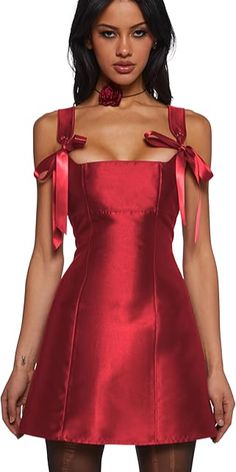 Quality Material: Made from non-stretch taffeta, this dress features a flattering fit and flare silhouette that adds a touch of elegance to your look.
Fun Features: The adjustable ribbon ties and back zipper closure make this dress both playful and practical, ensuring the perfect fit every time.
 #promdressinspo #formalwear #homecomingfashion #dressgoals Current Mood Clothing, Ribbon Dress, Current Mood, Pink Mini Dresses, Ribbon Tie, Red Mini Dress, Stardust, Dolls Kill, Pretty Dresses