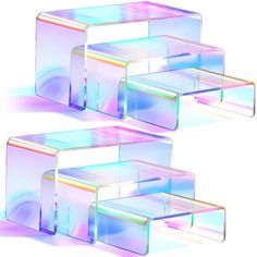 three clear plastic boxes sitting side by side on top of each other in the shape of rectangles