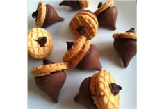 some cookies and pastries are arranged in the shape of star wars characters on a white surface