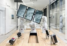 a room filled with lots of different types of electronic devices on wooden floor next to each other