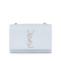 Carefully crafted from light blue supple leather, the Kate bag from Saint Laurent is the ideal accessory for any woman with a love for luxury and not a lot to carry. This mini gem is timelessly elegant and can be with any monochromatic or neutral toned outfit. Diverse and versatile, you can easily carry this bag from day to night. Dress it up with a cocktail dress and a pair of heels, or down with some black jeans and white sneakers to add a pop of colour to your casual look. Featuring romantic, silver tone hardware and prominent YSL logo, the Kate offers the perfect balance of fashion and function. Throw all your keys, cardholder, and favourite lipstick inside the small compartment and you're good to go! ?ÿ SPL Exterior Pebbled light blue leather Silver tone hardware YSL logo Chain strap Kate Bags, Ysl Logo, Gold Ounce, Chic Me, Saint Laurent Bag, Timeless Handbag, Leather Silver, Luxe Fashion, White Sneakers