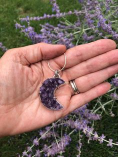 "Purple Raw Amethyst Moon Necklace, Purple Amethyst Moon Necklace, Purple Amethyst Crystal Moon, Crystal Healing Amethyst Necklace Crystal pendant is a gorgeous, yummy amethyst surrounded by a sterling bezel and secured by 3 prongs.  Pendant is 1 1/2\" long from top hoop to bottom of moon. View from side shows raw crystals approximately 3/8\" tall. Choice of 18\", 20\" or 24\" sterling snake chain. I hope you enjoy it! COME VISIT ME AT: https://www.facebook.com/Witt-N-Whimsy-331040443585943/?ref Celestial Amethyst Purple Necklace, Celestial Purple Amethyst Necklace, Mystical Amethyst Moon Phase Jewelry, Celestial Amethyst Jewelry For Healing, Purple Amethyst Celestial Jewelry, Celestial Amethyst Purple Jewelry, Celestial Purple Amethyst Jewelry, Mystical Moon Phase Purple Jewelry, Mystical Purple Moon Phase Jewelry