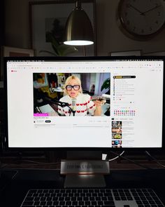 a computer monitor sitting on top of a desk