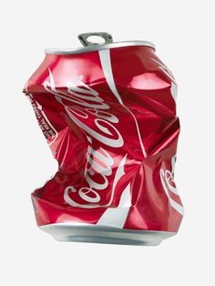 a can of coca - cola on a white background