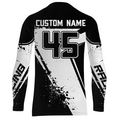 a black and white long sleeve shirt with the number 46 on it's chest