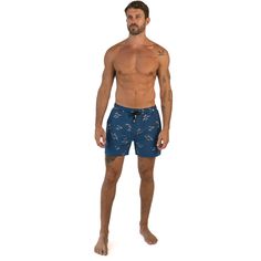 Ride the waves in style with our Caribbean Cove men's shorts. Inspired by the surf culture of the Caribbean, these shorts feature a trendy navy blue color scheme and a surf-inspired design. Perfect for the beach or the boardwalk, our shorts are made with high-quality materials that provide maximum comfort, durability, and flexibility. The elasticated waist and drawstring adjustment ensure a secure and comfortable fit, making them ideal for any activity. Whether you're surfing, swimming, or loung Casual Short Length Swimwear For Surfing, Blue Beachy Shorts For Swimming, Blue Beachy Swim Shorts, Beachy Blue Swimming Shorts, Navy Shorts For Poolside, Navy Summer Shorts For Beach Season, Casual Short Swimwear For Surfing, Tropical Style Blue Swim Trunks With Built-in Shorts, Tropical Blue Swim Trunks With Built-in Shorts