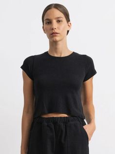 Lou Tee, Regen Silk Noil Jersey, Black | OZMA Fitted Black Cropped T-shirt For Everyday, Fitted Cropped T-shirt For Everyday Casual Wear, Minimalist Cropped Tops For Everyday, Casual Fitted Cropped T-shirt For Everyday, Effortless Fitted Tops For Everyday, Sleek Fitted Tops For Everyday, Everyday Summer Top With Straight Hem, Minimalist Fitted Short Sleeve Tops, Fitted Short Sleeve Minimalist Tops