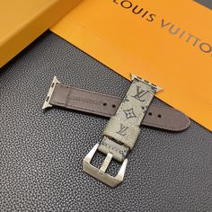 Monogram Canvas Design: The LV Luxury Leather Apple Watch Band features Louis Vuitton's iconic monogram canvas design. This instantly recognizable pattern, often consisting of LV initials and floral motifs, adds a touch of elegance and luxury to the Apple Watch, showcasing the brand's signature style. High-Quality Leather Construction: Crafted from premium leather, the watch band offers not only a stylish appearance but also durability and comfort. Louis Vuitton is known for using top-quality... Louis Vuitton Watch Band, Authentic Louis Vuitton Apple Watch Band, Luxury Leather Strap Apple Watch Band For Business, Louis Vuitton Apple Watch Band Silicone, Classic Phones, Louis Vuitton Phone Case With Magnetic Closure, Luxury Phone Case, Apple Watch Bands Leather, Lv Monogram