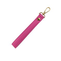 a pink leather key chain with a gold hook