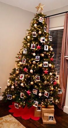 a decorated christmas tree with pictures on it