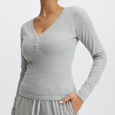 Fabletics Long-Sleeve Waffle Henley, Size Xl, In The Color Light Grey Heather, Brand New With Tag Attached! Great Condition. Casual Cozy Fit Tops For Relaxation, Cozy Fit Ribbed Tops For Loungewear, Ribbed Cozy Tops For Loungewear, Versatile Long Sleeve Activewear For Relaxation, Comfortable Long Sleeve Workout Tops, Cozy Fit Long Sleeve Workout Top, Spring V-neck Activewear For Loungewear, Gray Athleisure Tops For Loungewear, Stretch Ribbed Tops For Relaxation