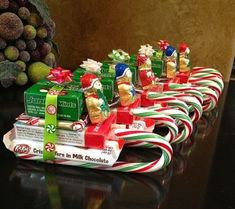 candy canes are lined up on a table