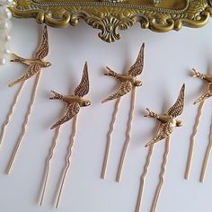 Gold Bird Hair Pins, perfect for a Wedding, bridesmaids, or any occasion. Made with KC gold birds and pins. Wonderful for a woodland themed Wedding. Stick pins are perfect for an up-do hairstyle.   Measures 3 1/2" (including pin) and birds measure 1 1/2" x 1"  Thank you for visiting Love Forever Bridal and please ask me any questions. Thanks so much! :) Bird Hair Pin, Angel Wing Hair Clip, Angel Wings Hair, Woodland Themed Wedding, Bird Themed Wedding, Hair Clips Wedding, Gold Birds, Gold Hair Clips, Gold Hair Accessories