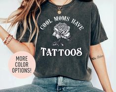 This Cool Moms Have Tattoos Shirt is the perfect Mother's Day gift, birthday gift, or Christmas gift for all Moms! All of our shirts are made with the highest quality materials and are super soft and cozy! 💚 HOW TO ORDER 💚 1. Check our photos for sizing and color options. 📏 2. Choose your quantity.  Feel free to add as many shirts as you wish! ✨ 3. Select your size and color from the drop-down menus. ✨ 4. Click "ADD TO CART" to add the shirt to your virtual cart. 🛒 5. Click "PROCEED TO CHECK Trendy Custom Print T-shirt Gift, Casual Tops With Custom Artwork As Gift, Casual Tops With Custom Artwork For Gift, Custom Print Relaxed Fit Shirt As Gift, Funny Print Shirt With Relaxed Fit As Gift, Relaxed Fit Shirt With Funny Print As Gift, Relaxed Fit Shirt With Funny Print For Gift, Funny Graphic Print Shirt For Mother's Day, Graphic Tee Shirt With Screen Print As Gift