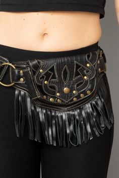 "This hip belt with tassels is sassy and practical at the same time. The pouch closes with two snap buttons for easy access to your smartphone, keys etc. Wear on your next trip or just to walk around the city with your essential securely on you *Available in dark brown or black * Fits any size phone * Soft leather * One large pocket that closes with a snap button * One secret pocket with zipper * Unisex ★ SIZES AVAILABLE Size S [ fits 30\" to 36\" ] or [ 79 - 92cm ] Size M [ fits 33\" to 39\" ] Leather Utility Belt, Travel Belt, Leather Hip Bag, Secret Pocket, Hip Belt, Utility Belt, Tassel Bag, Pocket Belt, Hip Bag