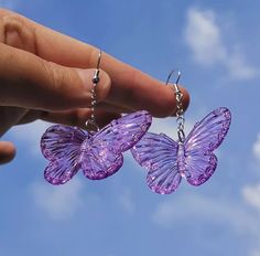 The Cutest Festival accessory! Perfect way to add to any festival look. Resin Butterfly, Y2k Earrings, Transparent Resin, Festival Accessories, Style Japonais, Statement Drop Earrings, Cute Butterfly, Hanging Earrings, Purple Butterfly