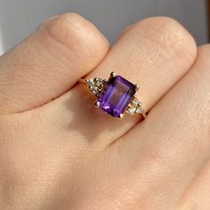 14KT Yellow Gold Emerald-Cut Purple Amethyst + Diamond Ring, 14KT Yellow Gold Emerald-Cut Purple Amethyst + Diamond Ring - Legacy Saint Jewelry Gold Ring With Amethyst, Gold Ring With Purple Stone, Emerald Cut Amethyst Ring, Emerald And Amethyst Ring, Manifesting Marriage, Amethist Ring, Amethyst Jewelry Ring, Purple Diamond Ring, Purple Engagement Rings