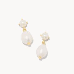 KENDRA SCOTT You’ll be the trendsetter to watch when you wear the Eve Gold Drop Earrings in White Pearl. Showcasing the natural beauty of cultured freshwater pearls, this dainty drop earring style will have you feeling dressed up for every occasion. Metal: 14k Yellow Gold Over Brass Material: White Pearl Closure: Ear Post Size: 0.96"L X 0.39"W Due to the one-of-a-kind nature of the medium, exact colors and patterns may vary slightly from the image shown. Swimsuit Jewelry, Jeweled Earrings, Freshwater Cultured Pearls, Effortless Elegance, Kendra Scott Jewelry, Stunning Earrings, Drop Earring, Gold Drop Earrings, Brass Material