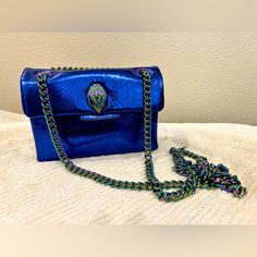 Rare Discontinued Kurt Geiger Mini Kensington Never Used, In Perfect Condition (No Tags) Authentic, Purchased At Nordstrom Bright Metallic Royal Blue With An Iridescent Rainbow Chain Strap And Bird On Front Strap Can Be Used As A Crossbody Or Doubled As A Shoulder Bag. Perfect For A Night Out! Approx Measurements: L - 7” H- 4.5” W- 2” Shoulder Strap - 12” Crossbody - 23” Reasonable Offers Only, No Trades Blue Leather Shoulder Evening Bag, Blue Leather Shoulder Bag For Party, Luxury Blue Evening Bag With Removable Pouch, Designer Blue Evening Bag, Luxury Blue Evening Bag With Detachable Strap, Blue Leather Party Bag, Luxury Blue Top Handle Evening Bag, Blue Luxury Evening Bag With Removable Pouch, Blue Luxury Top Handle Evening Bag