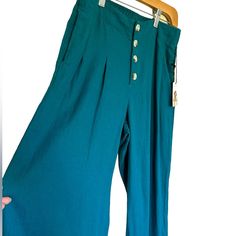 Sincerly Jules Teal Blue Wide Leg Pants New With Tags Size Small 55% Linen 45% Rayon Elastic Stretch Waistband In The Back Functional Front Buttons Front Pockets Machine Washable And Dryable Smoke Free Environment Turquoise High Waist Bottoms For Summer, Summer Green Pants With Buttons, Casual Fitted Turquoise Pants, Fitted Turquoise Casual Pants, Blue Buttoned Bottoms For Spring, Blue Bottoms With Buttons For Spring, Casual Turquoise Wide Leg Bottoms, High Rise Blue Pants With Buttons, Blue Wide Leg Bottoms With Buttons