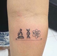 an arm with three different tattoos on it, one is for science and the other is for