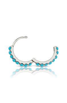 Designed by the famed NYC piercing studio, a tiny 14-karat-gold hoop to wear anywhere along the ear boasts an unbroken line of turquoise beads. Sold as a single earring 1/2" hoop diameter Snap-post closure Best suited for earlobe and helix piercings Hypoallergenic 14k gold/turquoise Imported Stackable Sterling Silver Hoop Earrings Fine Jewelry, Stackable Sterling Silver Hoop Earrings, Turquoise Sterling Silver Huggie Jewelry, Sterling Silver Turquoise Single Earring, Turquoise Sterling Silver Single Earring, Turquoise Sterling Silver Small Hoop Jewelry, Turquoise Single Small Hoop Earring, Helix Piercings, Maria Tash