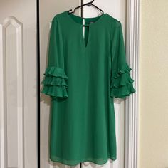 Beautiful Green Color Vince Camuto Dress Size 8, With A Little Ruffle On Sleeves. Perfect For A Night Out Or Wedding. Green Pleated Mini Dress For Brunch, Green Shift Dress For Party, Green Ruffled Dresses For Work, Green Flowy Dress For Work, Elegant Green Shift Mini Dress, Green Lined Dresses For Work, Green Lined Dress For Workwear, Emerald Green Velvet Dress, Womens Evening Gowns