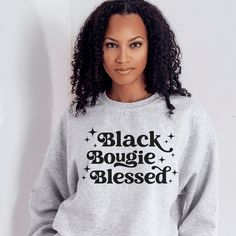 Introducing our "Black Bougie Blessed" sweatshirt, a stylish and comfortable addition to your wardrobe that celebrates the pride and joy of Black culture. Crafted from high-quality materials, this sweatshirt features a bold and empowering message that speaks to the unique experience of being Black and feeling blessed. The phrase "Black Bougie Blessed" is a nod to the rich history and traditions of Black excellence, while also highlighting the resilience and strength of the Black community. Order yours today and experience the comfort and style of a product that celebrates the unique beauty and strength of Black culture. Shop our Black Bougie Blessed T-Shirt! ♥ We want you to be happy with your item, and for it to bring you joy! If you have any problems with your order or your item, please Black Sweatshirt With Lettering For Winter, Black Sweatshirt With Slogan In Relaxed Fit, Black Relaxed Fit Sweatshirt With Slogan, Relaxed Fit Black Sweatshirt With Slogan, Black Crew Neck Sweatshirt With Lettering, Oversized Black Sweatshirt With Slogan, Black Slogan Sweater For Streetwear, Feeling Blessed, Melanin Poppin