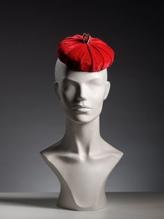 "You are looking at a very classical round pill box in red velvet.  This headpiece although very simple in style but can definitely turn heads when in public. It hat a mall bling-detail, which catches the light in such an amazing way.  It can be made in different colours. Please inquire about available colours.  It has a comb and a elastic band to sit comfortably on your hair.  Very stylish and flattering if you go for a vintage inspired look and finish it with such a lovely hat. If you have any Luxury Red Mini Hat For Wedding, Retro Red Party Hat, Red Retro Party Hat, Vintage Red Mini Hat For Kentucky Derby, Red Vintage Mini Hats For Kentucky Derby, Red Party Hat With Round Crown, Elegant Flat Cap For Party, Red Structured Crown Hat For Evening, Elegant Red Cloche Mini Hat