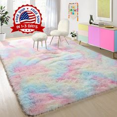 an area rug that has been dyed with pastel colors and is in the middle of a living room