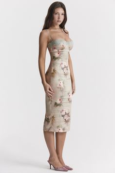 DetailsPretty floral dresses are what we're loving this season and 'Venus' has a delicate vintage feel. Cut from our luxurious stretch sheen satin. it has a vintage floral print with a romantic lace trim that makes this gorgeous creation even more beautiful. The underwired cups lift and flatter the bust and the shoulder straps adjust to your preferred fit.'Venus' skims over your figure as it falls to an ultra feminine midi length that has a split to the back for easy movement. It zips up the bac Pretty Floral Dress, Bandeau Tops, Venus Dresses, Ultra Feminine, Women's Robe, Lace Print, Romantic Lace, Print Midi Dress, Vintage Floral Print