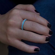 An Exquisite Eternity Ring Set with Blue Opals in a Pave style setting. Each ring is made to order by an artist with the highest attention to detail. Each gemstone set in this ring is handpicked for consistency and quality. -Handmade to order, Quick shipping, fully insured and traceable online. -Made in Solid Gold, choose between 10/14/18 Karat. -Custom Gold Color choose between Rose Gold, Yellow Gold and White Gold. -Stone information: 3 mm Light Blue Opal, stone count subject to ring size, siz Opal Ring With Round Band For Promise, Blue Opal Rings For Anniversary, Blue Opal Promise Ring, Blue Opal Anniversary Rings, Fine Jewelry Opal Ring With Round Band, Eternity Ring Set, Blue Opal Ring, Opal Ring Gold, 14k Gold Ring