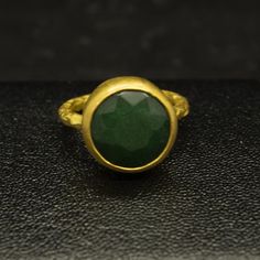 Green Emerald Ring | 24K Gold Plated | Minimalist  Jewelry | Statement 925 Sterling Silver Ring | Birthstone Ring | Dainty Ring Our shop offer free ring sizingHandcrafted hammered  ring Metal : 925 Sterling SilverPlating : 24K GoldBand Width : 2 mmGem Stone : Lab Emerald Gem Size : 11 mmRing Weight : 4.3 gramsRing Size : US 6 (The size you want is made for free).(We used the US standard sizing) **Custom Orders is Made**As pellada family, we will be happy to help you if you contact us with the ph Minimalist Green Signet Ring, Gold Minimalist Emerald Ring In Sterling Silver, Minimalist Gold Emerald Ring In Sterling Silver, Modern Green Emerald Signet Ring, Formal Green Gemstone Signet Ring, Green Emerald-cut Signet Ring For May Birthstone, Oval Emerald Ring In Gold-toned Sterling Silver, Hammered Jewelry, Green Emerald Ring